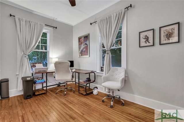 202 E 51st St, Savannah, GA 31405 - home office with wood finished floors, baseboards, and ceiling fan
