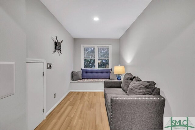 202 E 51st St, Savannah, GA 31405 - living room featuring light wood-style flooring, recessed lighting, and baseboards