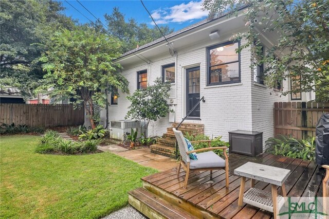 202 E 51st St, Savannah, GA 31405 - rear view of property with entry steps, brick siding, a deck, and central AC unit