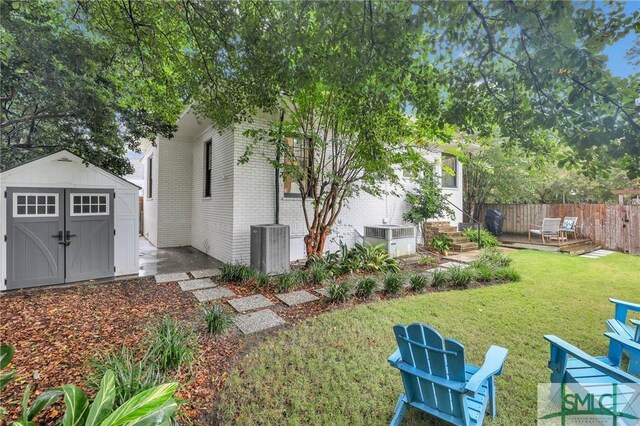 202 E 51st St, Savannah, GA 31405 - view of yard featuring a wooden deck and cooling unit