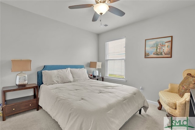 carpeted bedroom with ceiling fan