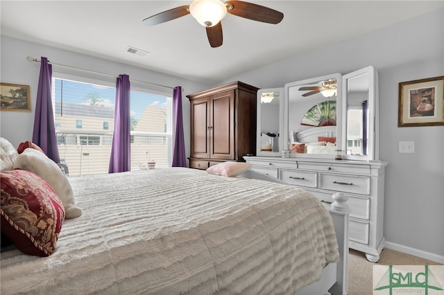 carpeted bedroom with ceiling fan