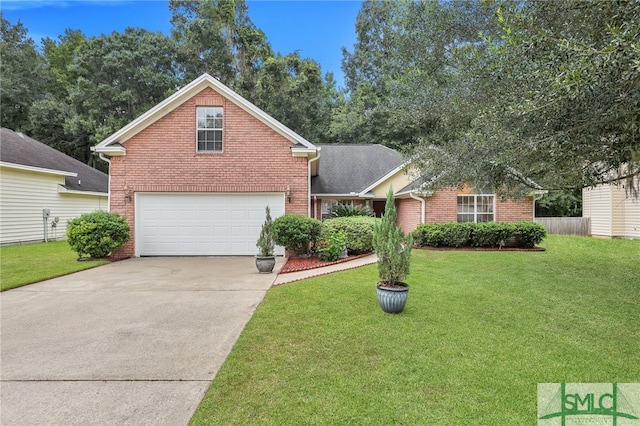 view of front property with a front lawn and a garage