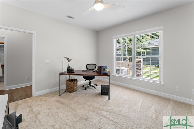 office space featuring carpet flooring and ceiling fan