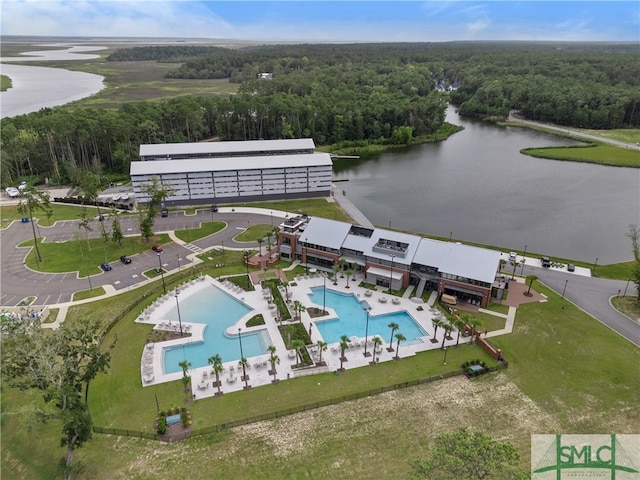 bird's eye view with a water view