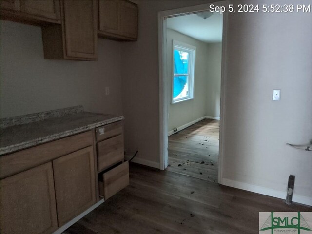 kitchen featuring dark hardwood / wood-style flooring