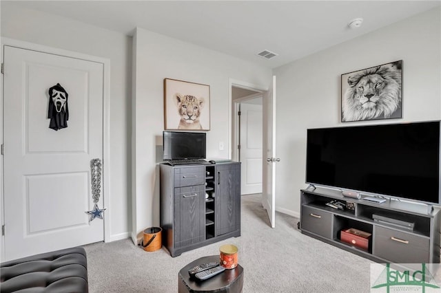 living room with baseboards and carpet