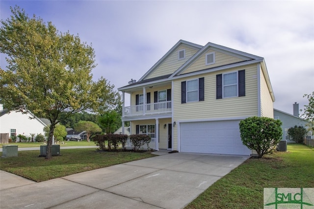 view of front of home featuring cooling unit, a front lawn, a garage, and a balcony