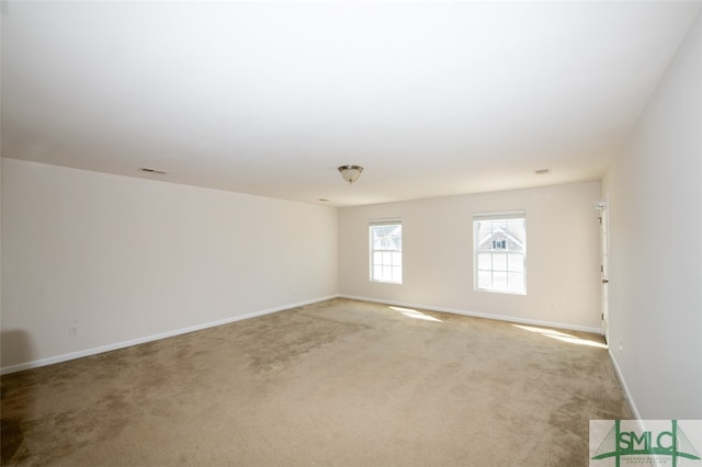 unfurnished room with carpet floors