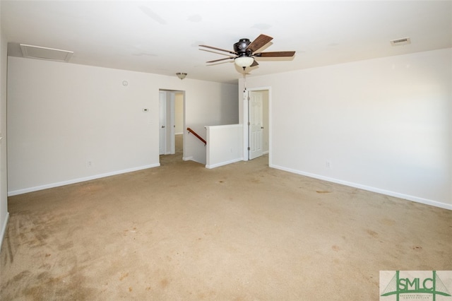 carpeted empty room with ceiling fan