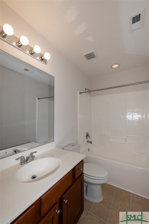 full bathroom with vanity, tub / shower combination, toilet, and tile patterned floors