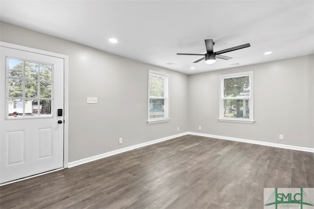 foyer entrance featuring ceiling fan and dark hardwood / wood-style flooring