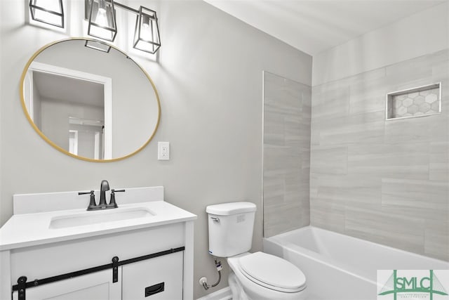 full bathroom with tiled shower / bath combo, vanity, and toilet