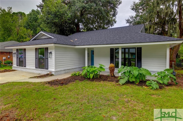 ranch-style house with a front lawn