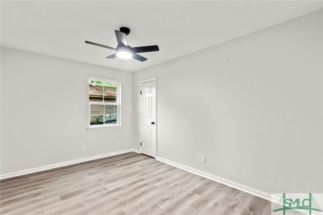 unfurnished room featuring light wood-type flooring and ceiling fan