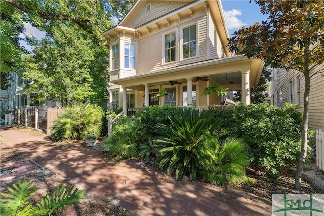 view of front of home featuring a porch and ceiling fan