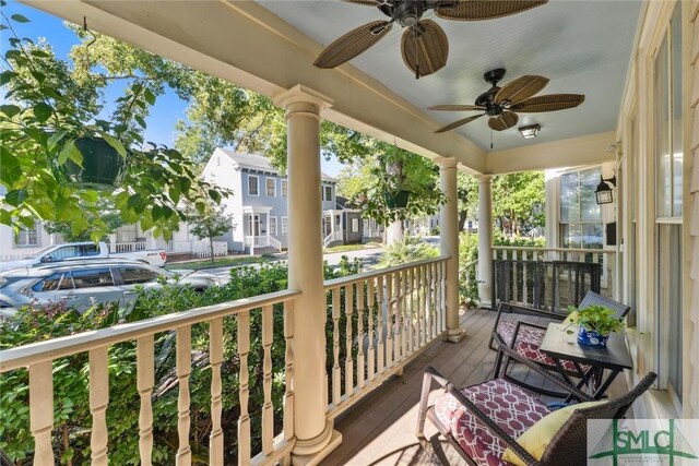 balcony featuring ceiling fan and covered porch