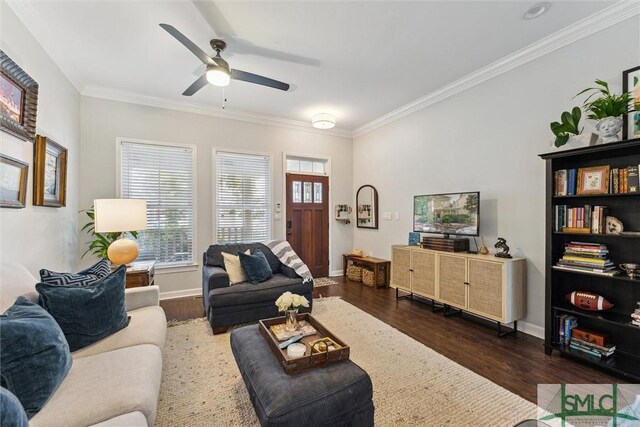 living room featuring ornamental molding, ceiling fan, and dark hardwood / wood-style flooring