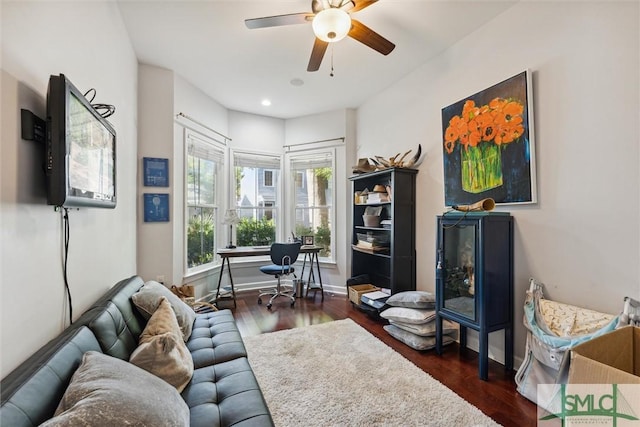 office space featuring a ceiling fan, recessed lighting, dark wood-style flooring, and baseboards