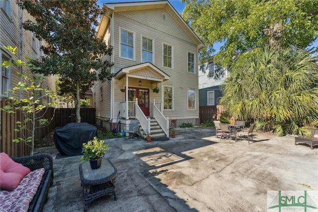 back of property with a patio area