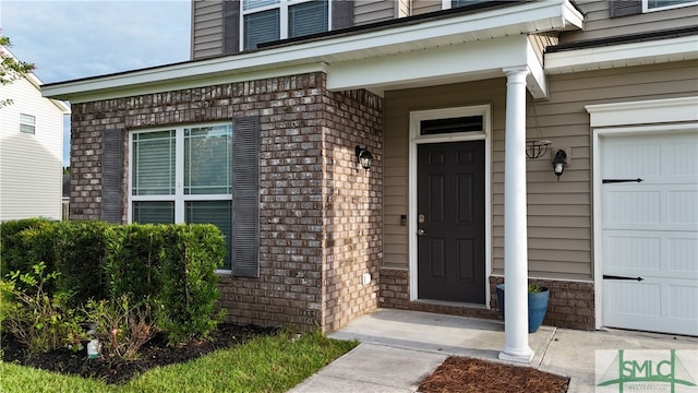 entrance to property with a garage