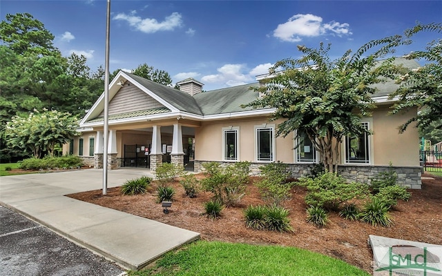 view of front of property with a patio