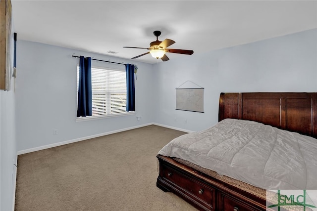 unfurnished bedroom featuring light carpet and ceiling fan