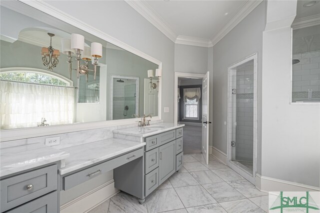 bathroom with ornamental molding, vanity, and walk in shower