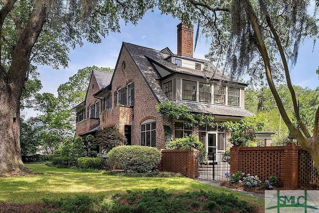 view of home's exterior featuring a yard