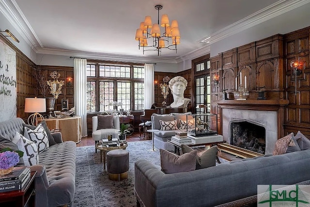 interior space with wood-type flooring, a fireplace, a chandelier, and crown molding