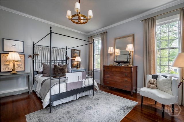 56 E 54th St, Savannah, GA 31405 - bedroom with a chandelier, wood finished floors, multiple windows, and ornamental molding
