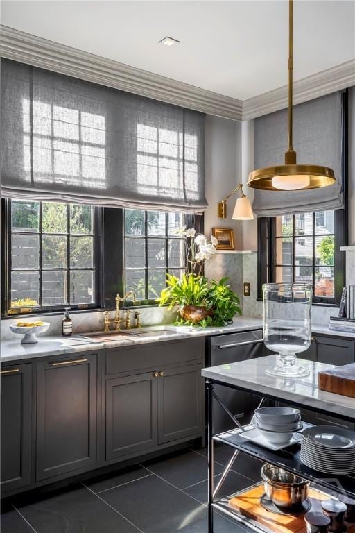 56 E 54th St, Savannah, GA 31405 - kitchen with dark tile patterned flooring, plenty of natural light, light countertops, and crown molding