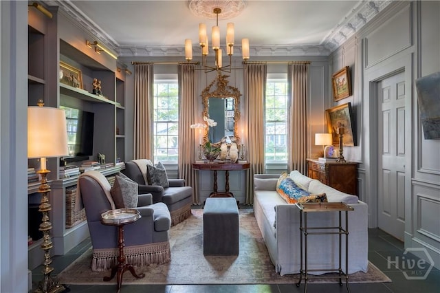 56 E 54th St, Savannah, GA 31405 - living area with healthy amount of natural light, tile patterned floors, and crown molding