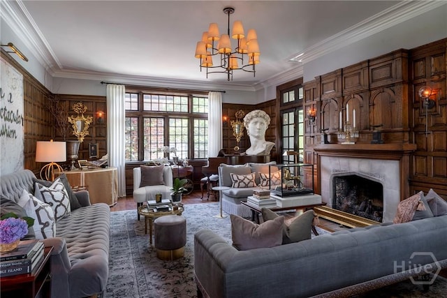 56 E 54th St, Savannah, GA 31405 - living room featuring a chandelier, crown molding, wood finished floors, and a fireplace