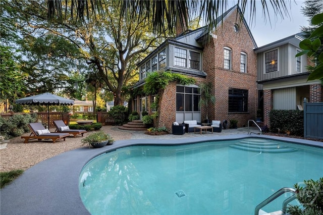 56 E 54th St, Savannah, GA 31405 - view of swimming pool featuring a patio area and outdoor lounge area