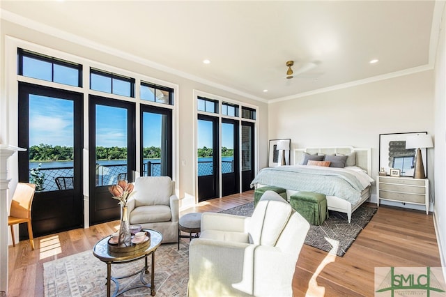 bedroom featuring crown molding, access to exterior, ceiling fan, and wood-type flooring