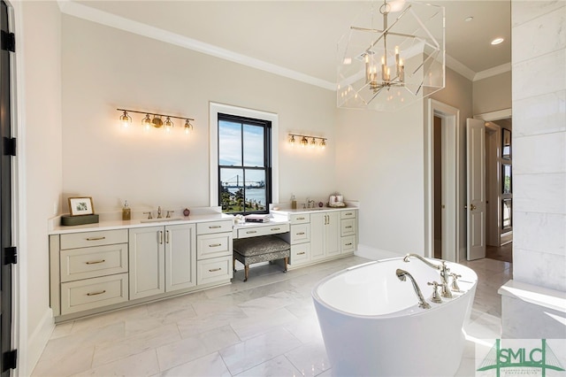 bathroom featuring a notable chandelier, a bathtub, crown molding, and vanity