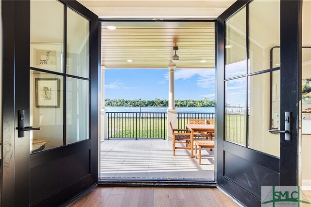 doorway to outside featuring hardwood / wood-style floors