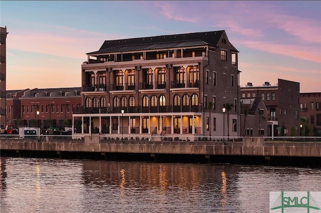 outdoor building at dusk with a water view