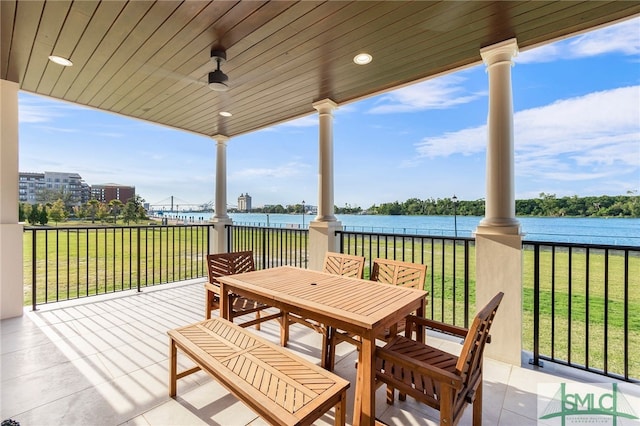 view of patio / terrace with a water view