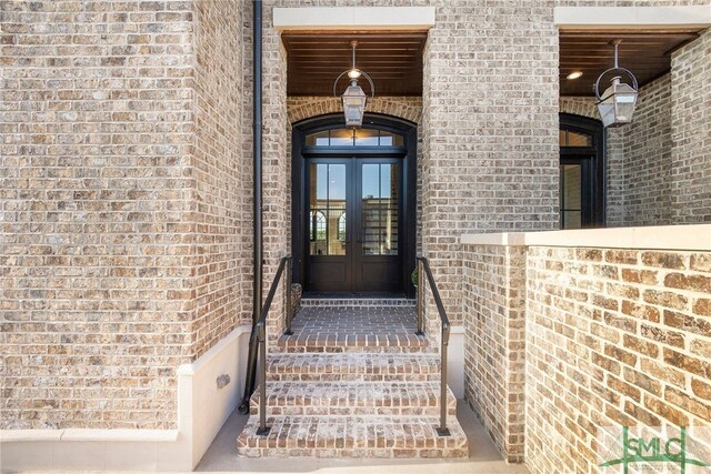 doorway to property featuring french doors