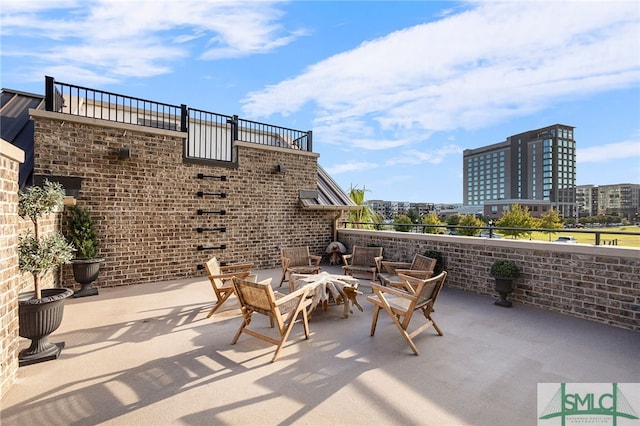 view of patio / terrace featuring a balcony