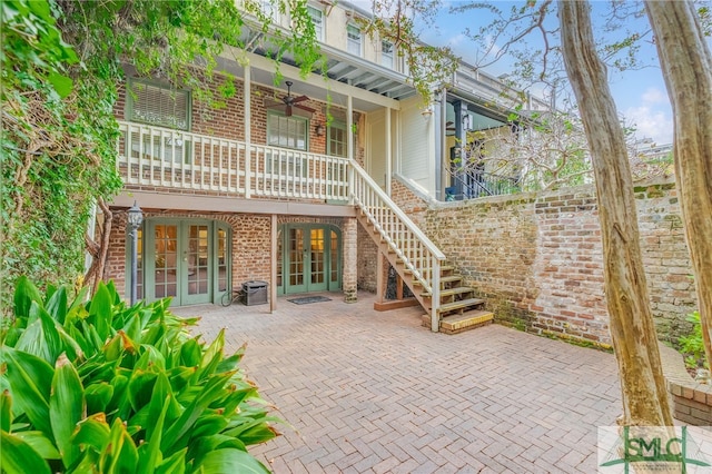 back of property featuring central AC, ceiling fan, a patio, and french doors