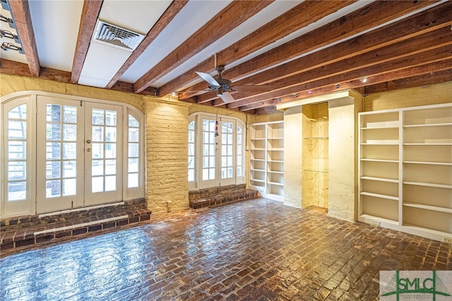 115 W Gordon St, Savannah, GA 31401 - unfurnished living room with a ceiling fan, french doors, beamed ceiling, and brick floors