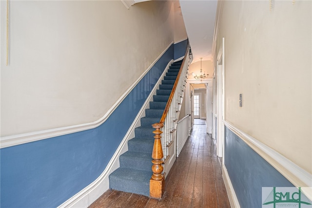 staircase featuring hardwood / wood-style flooring