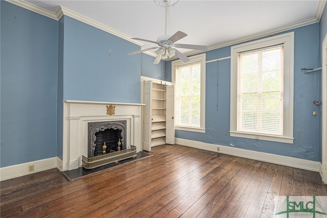 unfurnished living room with dark wood-type flooring, ceiling fan, and ornamental molding