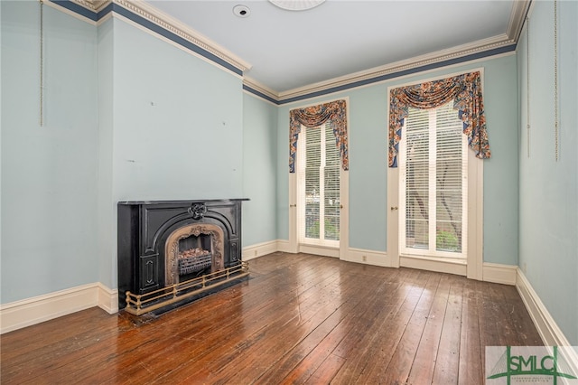 living room with crown molding and hardwood / wood-style flooring