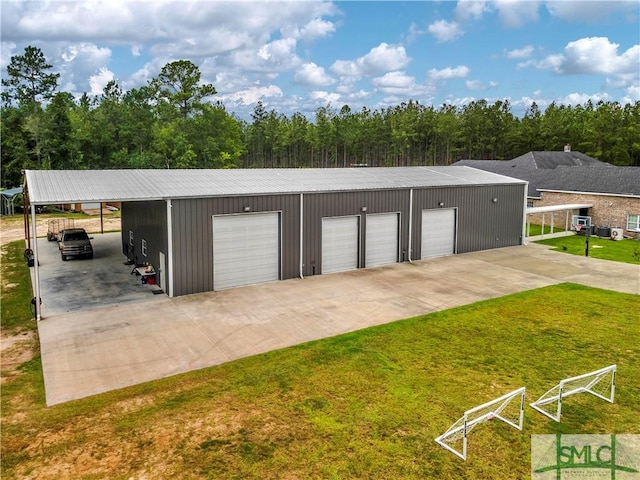 garage with a yard