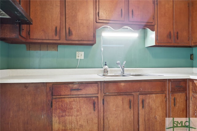 kitchen with sink and ventilation hood