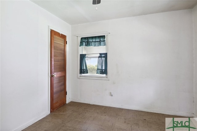 interior space featuring ceiling fan